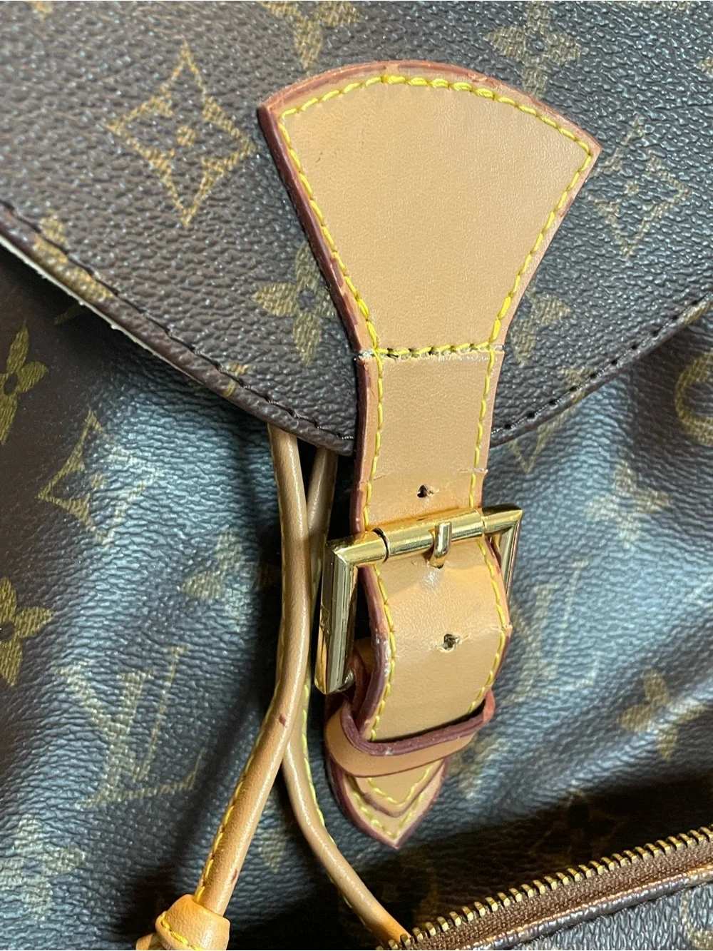 Brown Monogram Canvas Backpack broken from pocket zipper